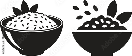 Two bowls of rice with leaves and falling grains