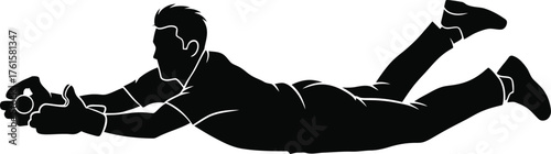 Silhouette of a baseball player diving to catch a ball