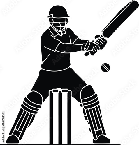 Silhouette of a cricket player batting during a match