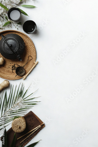 Aesthetic flat lay of dark food and tropical leaves
