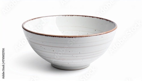 A plain white ceramic bowl with a subtle speckled pattern and smooth surface sits empty against a white background
