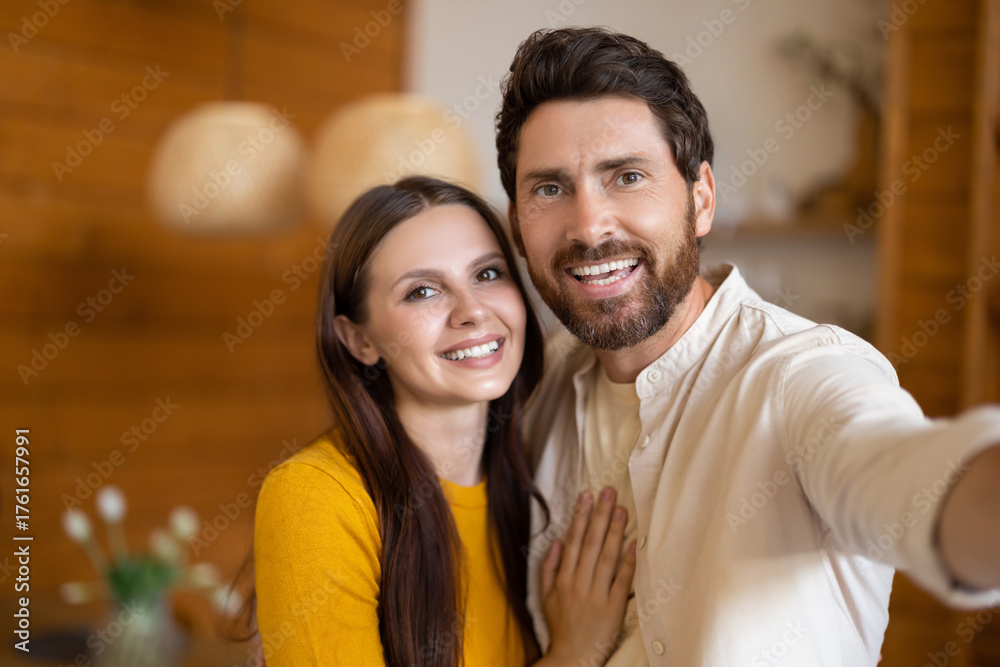 Fototapeta premium Smiling man and woman feeling excited and joyful together