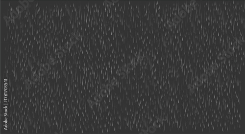 Heavy rain background with falling raindrops on dark surface