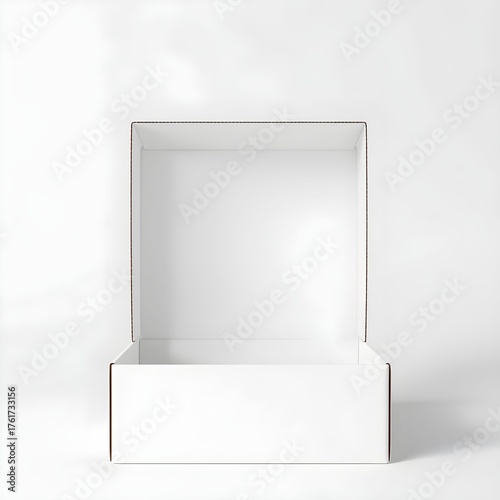 An open, empty, square, white cardboard box with the lid propped up against a plain white background.