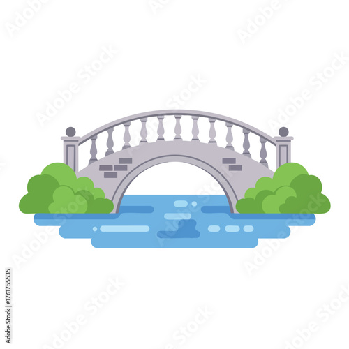 Classic gray stone arch bridge with an elegant balustrade railing spanning over calm blue water with green bushes.