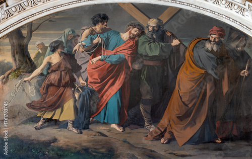 Принти на полотні SALZBURG, AUSTRIA - SEPTEMBER 6, 2025: The painting of Simon of Cyrene help Jesus to carry his cross in the Cathedral by Ludwig Glötzle from second half of 19