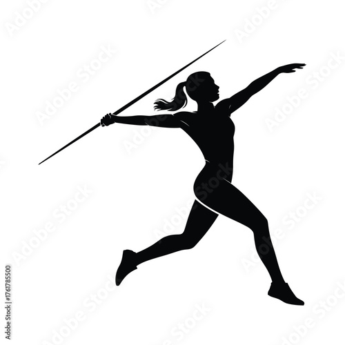 Silhouette of a female athlete in mid throw of a javelin during a track and field competition