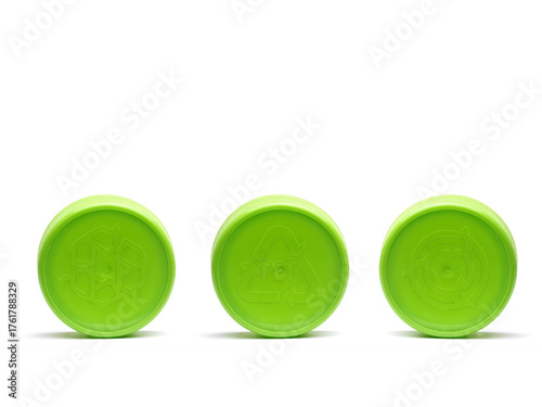 Three green plastic caps with different recycle symbols embossed shot on white