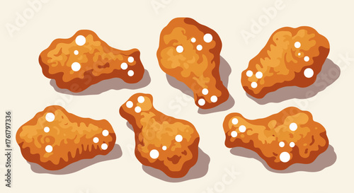 Crispy golden brown fried chicken wings sprinkled with white seasoning dots presented on a light background.