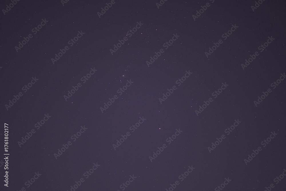 Obraz premium Starry Night Sky with Visible Stars over Dark Horizon