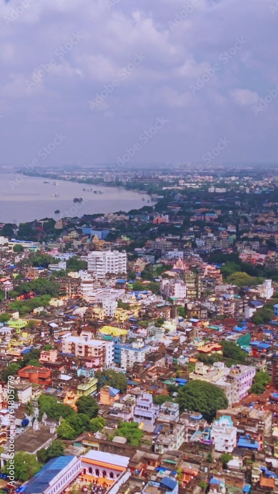 Fototapeta premium Cinematic Drone Shot of Kolkata City and Hooghly River View