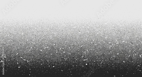 Monochromatic grainy gradient background with dispersed speckles and diffused texture