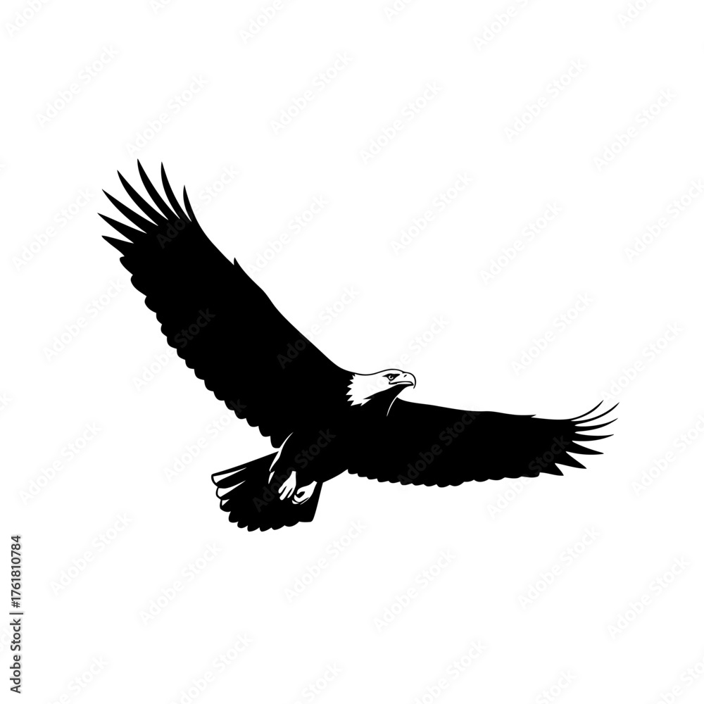 Fototapeta premium A black silhouette of a majestic bald eagle soaring with its wings spread wide against a white background.