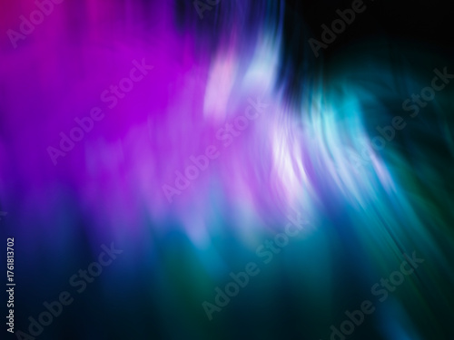 Ethereal swirls of colorful light in motion.