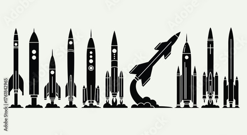 Silhouetted rockets in a row, with one launching.