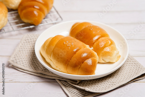 (Shio Pan) Japanese style salt bread that is characterized by its crispy exterior and soft, buttery interior.