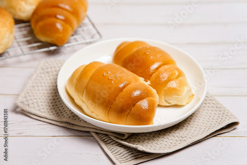 (Shio Pan) Japanese style salt bread that is characterized by its crispy exterior and soft, buttery interior.