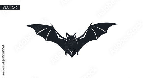 A black silhouette of a flying bat with its wings spread wide a classic spooky Halloween vector icon.