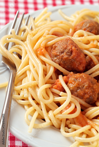 Spaghetti and Meatballs. An Italian-American pasta dish inspired by similar dishes from southern Italy, spaghetti and meatballs was developed by Italian immigrants in New York City.