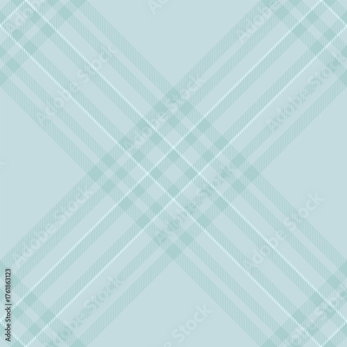 Elegant tartan pattern in muted blue tones. Classic and versatile background for textile design, fashion projects, or refined graphic elements.