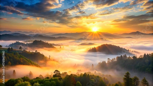 Golden sunrise over misty mountains and forest canopy