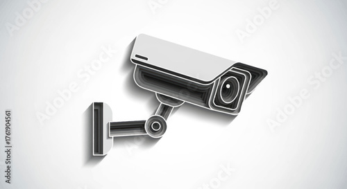 Modern surveillance security camera mounted on a white wall.