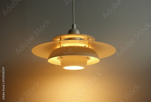 Mid century pendant lamp in multi layer design.
