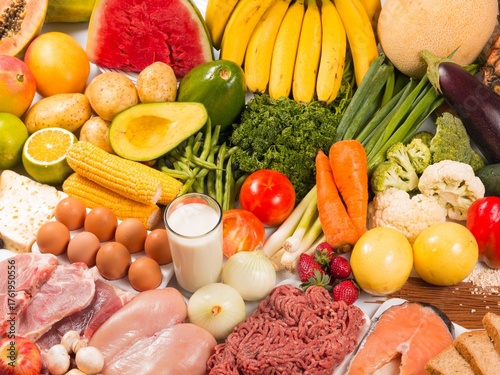 Assorted Healthy Foods Including Fruits, Vegetables, Meat, and Dairy Products