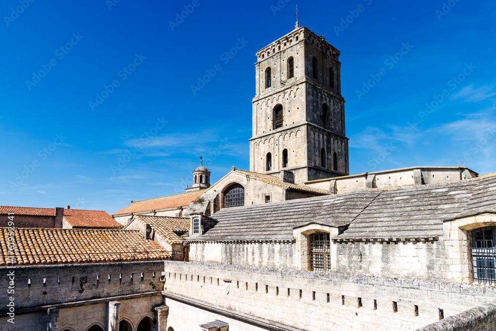 Fototapeta premium Cloister and bell tower of church of St. Trophime, in Arles, France, Europe