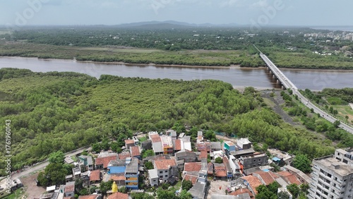 Photography High-resolution aerial photograph showcasing a vibrant coastal city in India, bo
