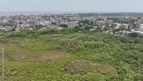 Photography High-resolution aerial photograph showcasing a vibrant coastal city in India, bo