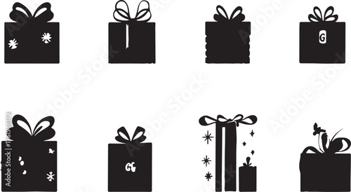 A collection of black gift boxes and tags with ribbon and bow for a Christmas or birthday celebration