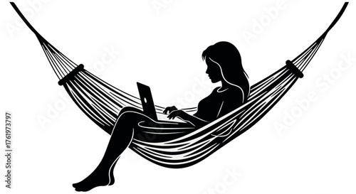 Relaxed woman typing on laptop while resting in a hammock outdoors