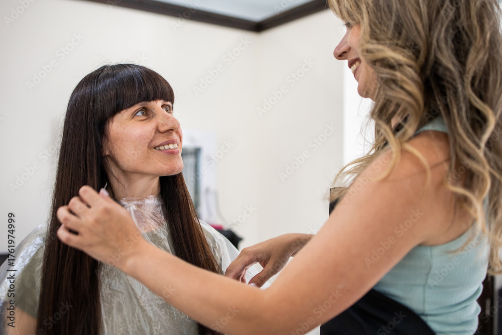 Fototapeta premium Hair salon woman haircut. Woman at the hairdresser. Hairdresser for women