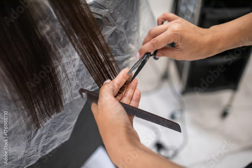 Scissors cutting hair