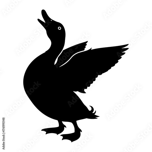 Black goose calling with wings spread bird