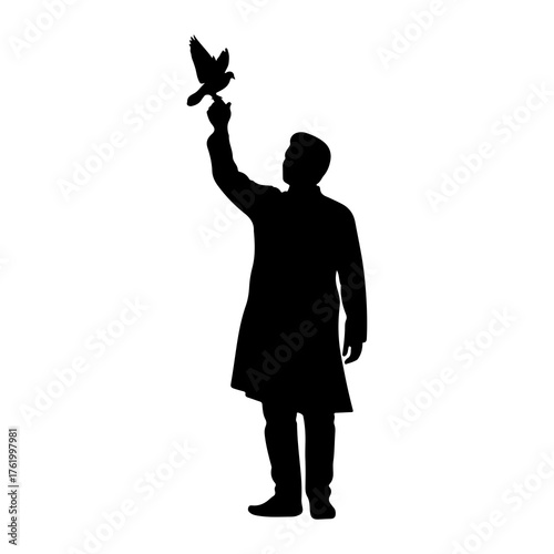 Person releasing bird silhouette dove