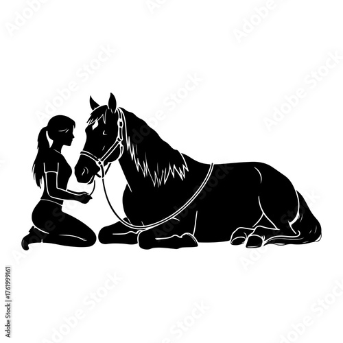 Woman kneeling beside resting horse girl equine