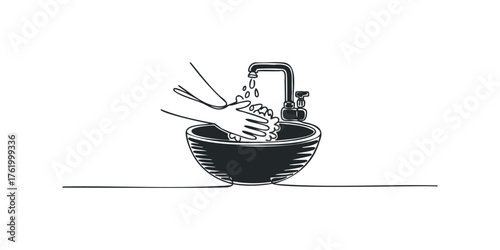 Person washing hands under running water in a sink