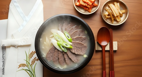 Seolleongtang Ox Bone Soup with Sliced Brisket, Scallions, and Kimchi Side Dishes (Korean Cuisine)