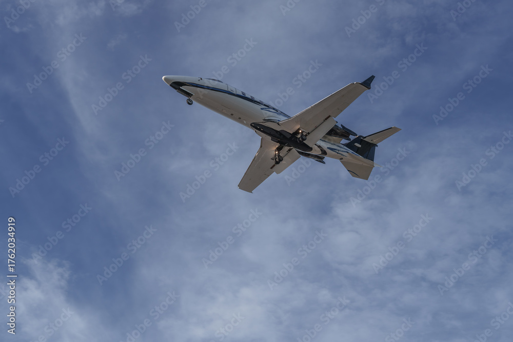 Fototapeta premium Corporate aircraft flying over
