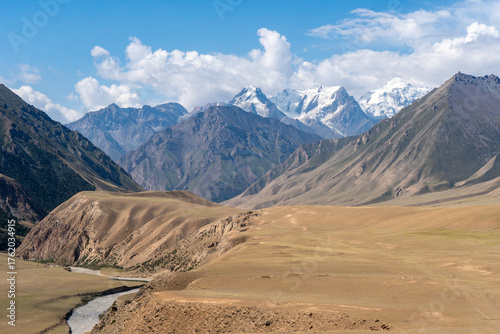 Mountain landscape with a river and snow-capped peaks, Kyrgyzstan