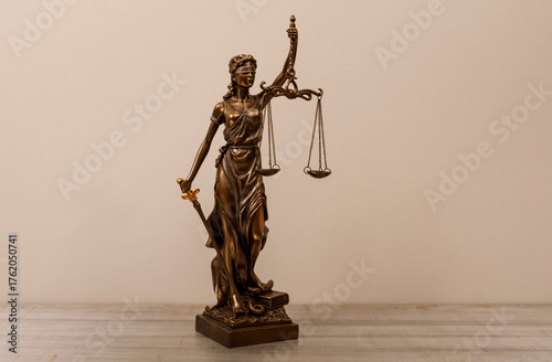 A bronze statue of Lady Jus...