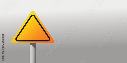 Blank yellow warning sign triangle on pole with copy space, represents concepts such as caution, danger, hazard, roadwork, alert, and customizable notification
