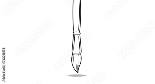 A close up view of a paintbrush ready to create art.