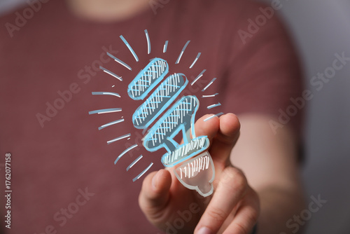 Image of a hand holding a s...