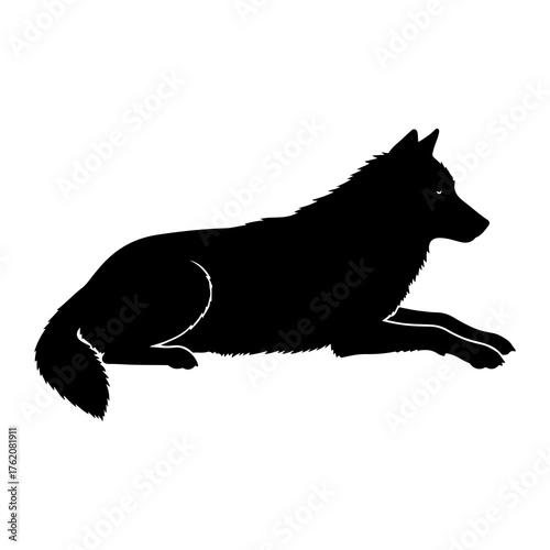 Black wolf lying down profile silhouette resting
