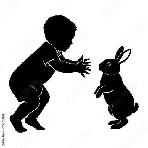Child reaching for rabbit baby bunny