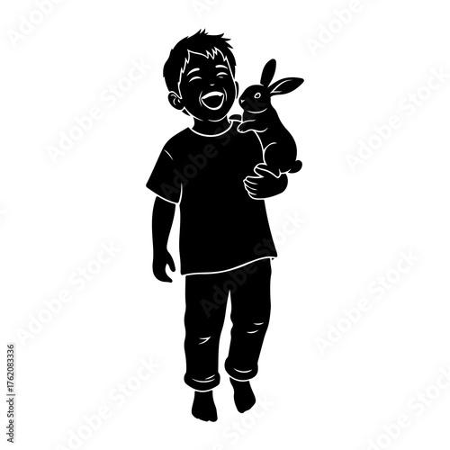Joyful boy holding rabbit child bunny