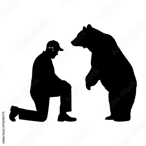 Man kneeling before standing bear silhouette